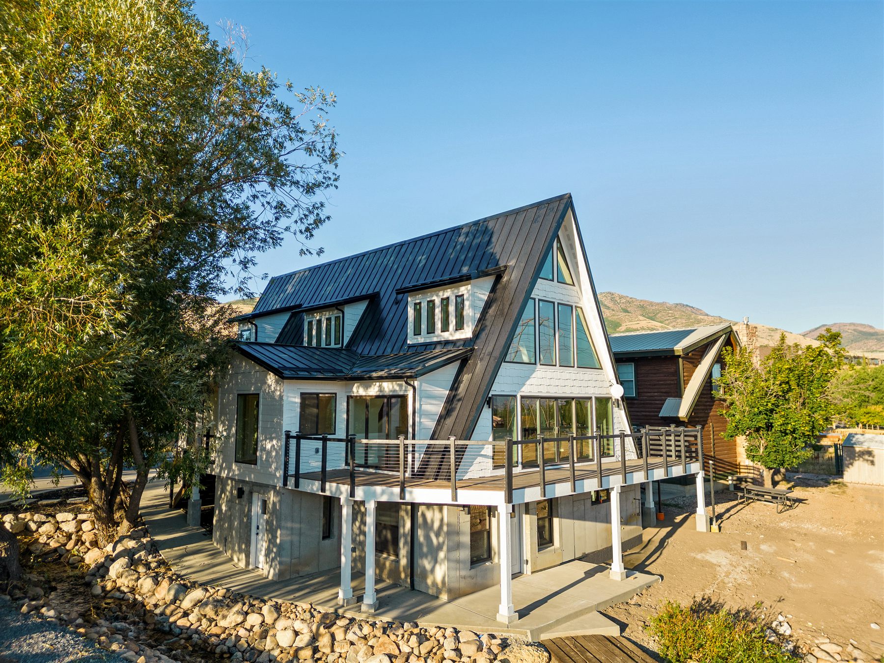 Custom Avrame A-frame mountain home exterior in Eden, Utah