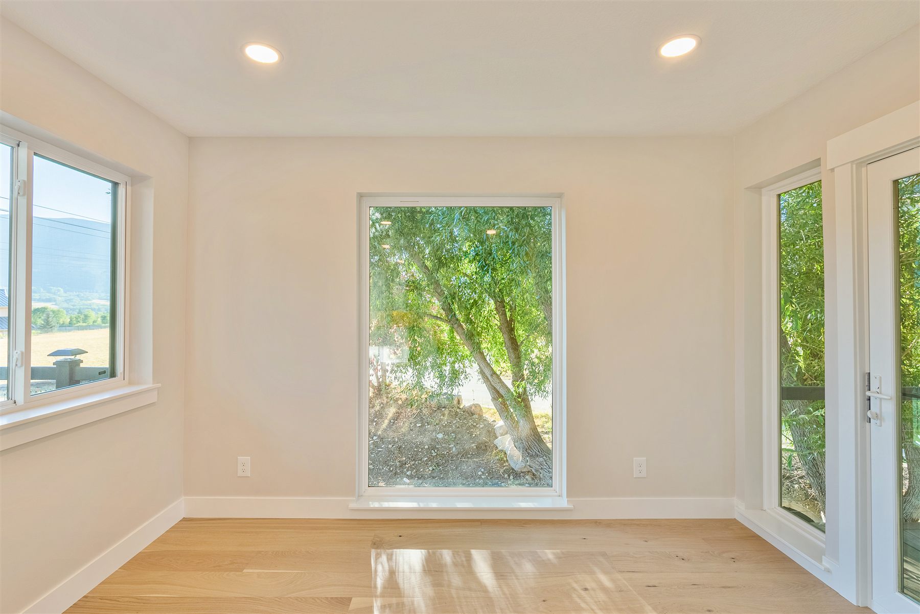 Sunlit living area window nook in the Eden Avrame custom home