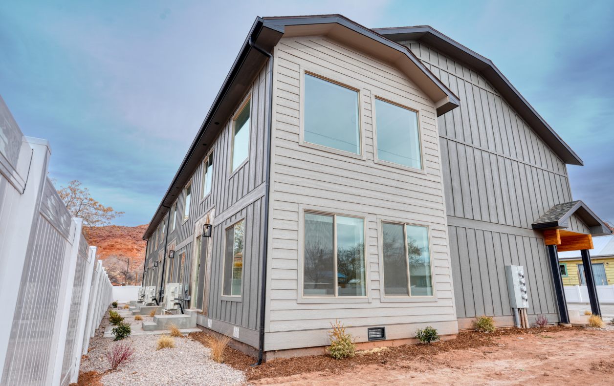 Moab Townhome Complex exterior with red rock backdrop in Moab, Utah