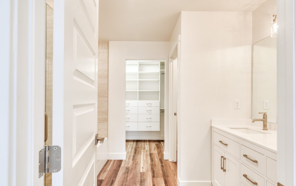 Bright hallway and closet finishes in a Moab townhome unit
